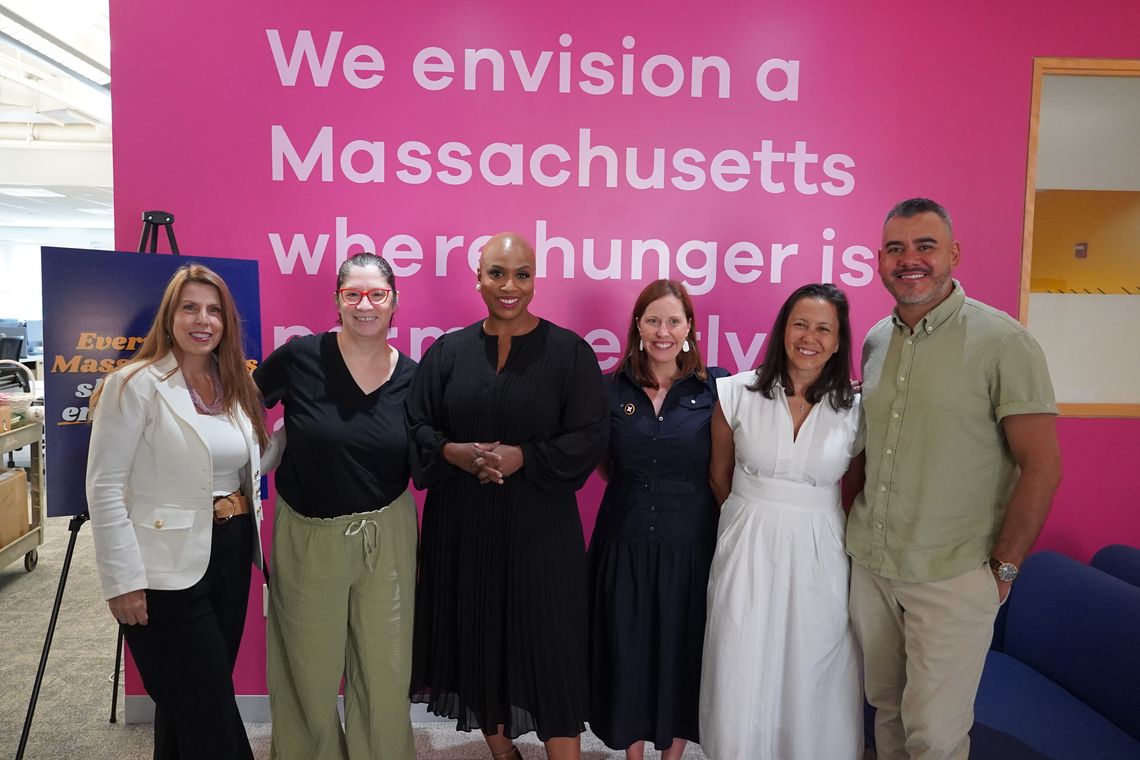 Rep. Pressley posing with Council of Experts and Erin McAleer