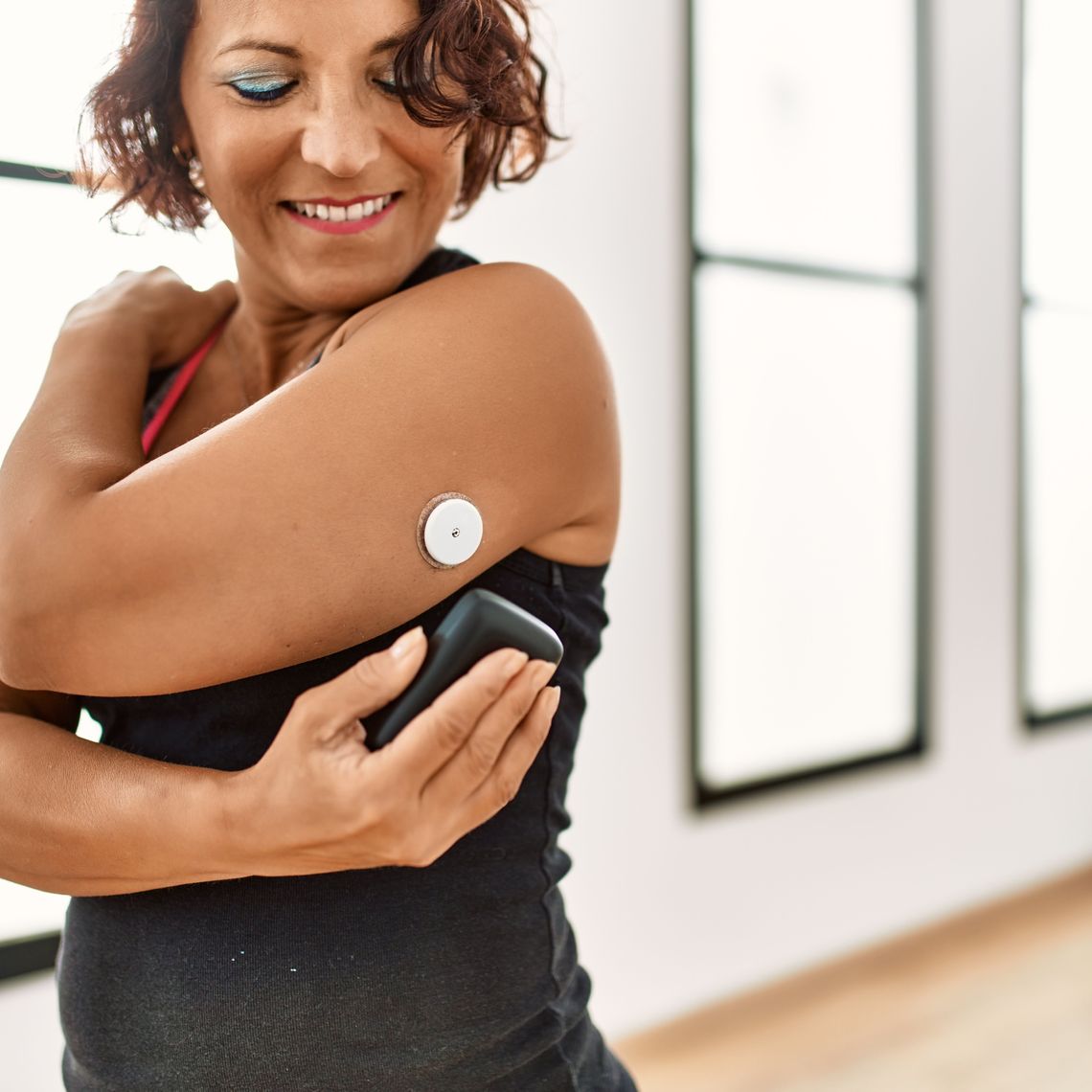 woman applying medical device