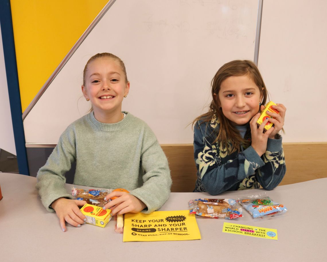 Students enjoy breakfast at school