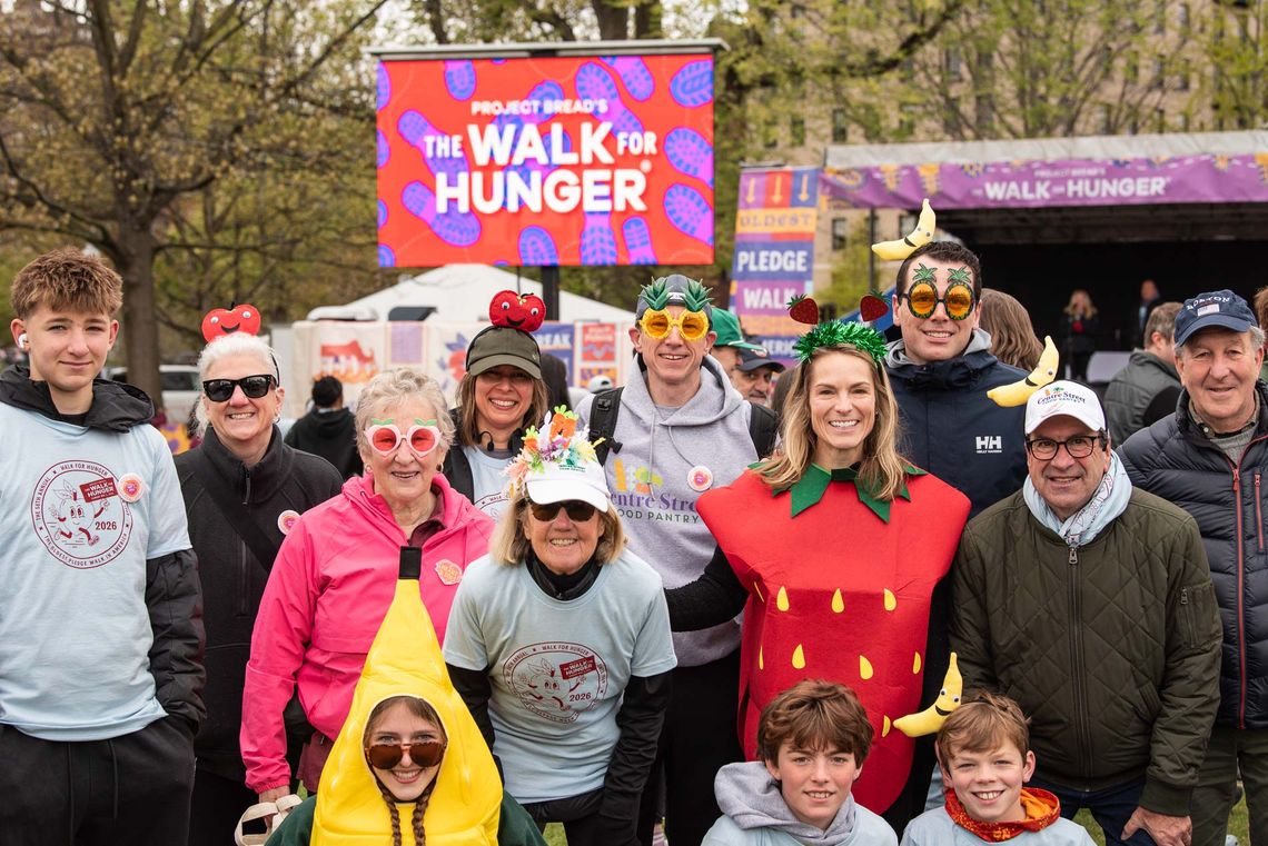 Walk team smiles at camera dressed as fruit