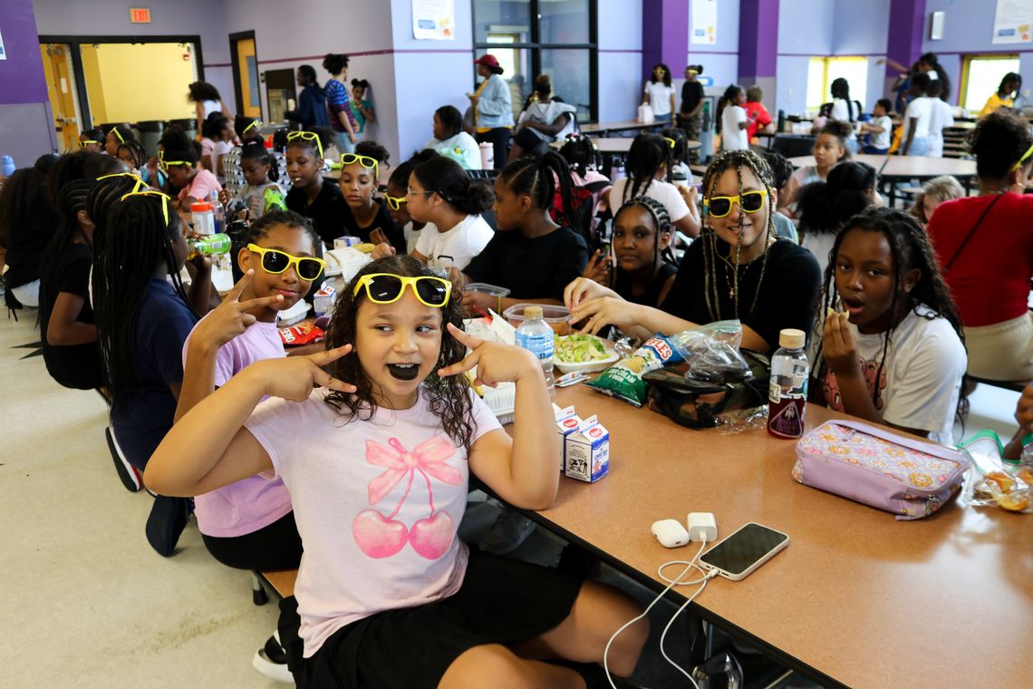 Kids and teens enjoy Summer Eats at Orchard Gardens in Roxbury.