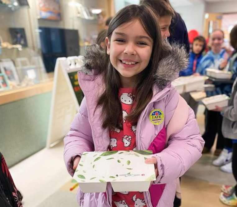 Young Girl with Breakfast at School